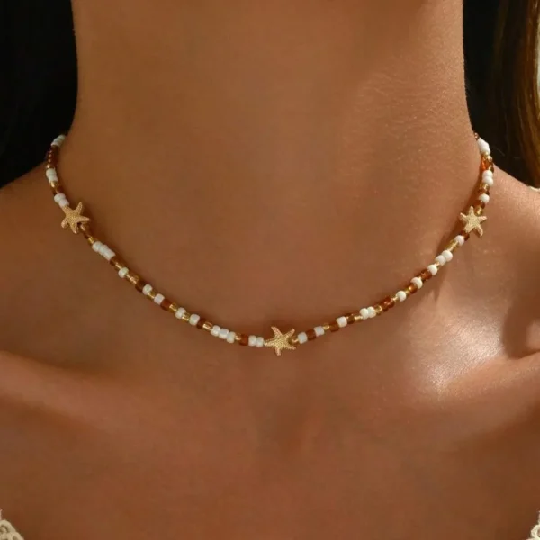 collier perles motifs coquillages