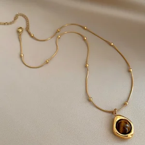 collier pendentif doré combi