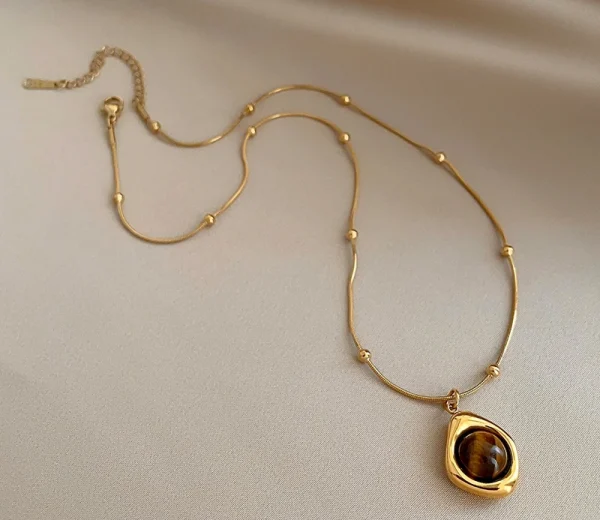 collier pendentif doré combi